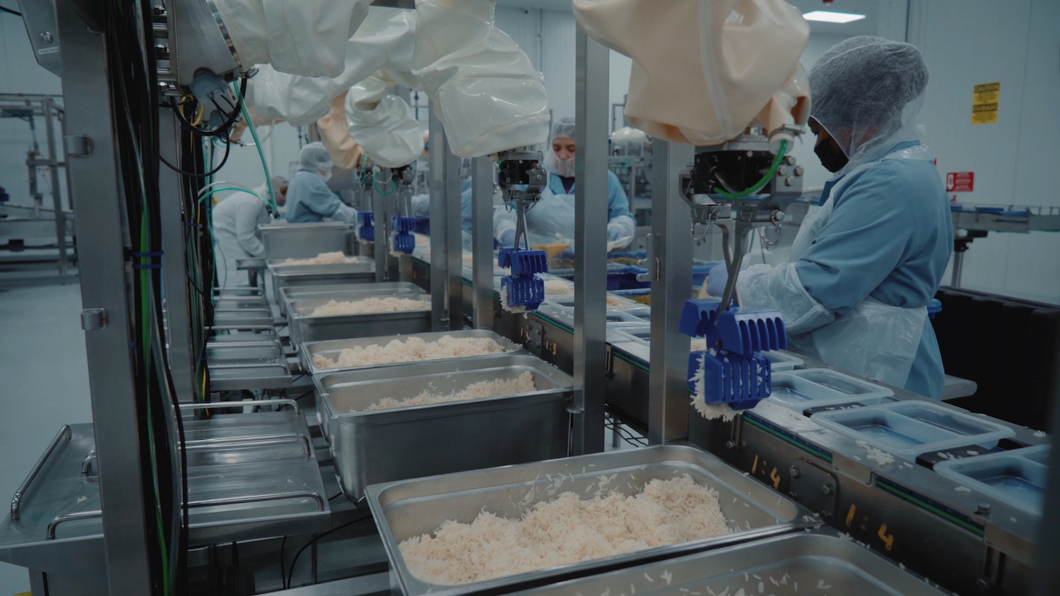 How Chef Robots Coordinate to Maximize Throughput